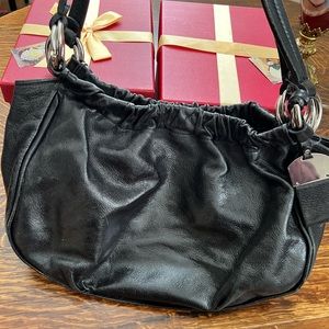 Francesco Biasia black leather shoulder bag missing grommet inside